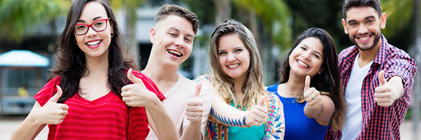 People on starting line. Group of young people are standing on starting line and are looking forward while isolated on white.