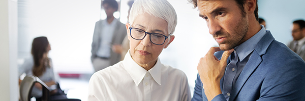 Successful group of business people at work in modern office